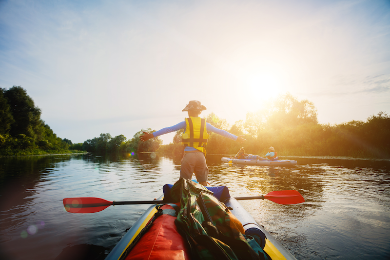 canoe guide at sunset