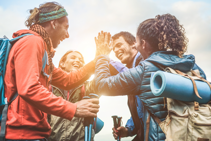 hikers high five